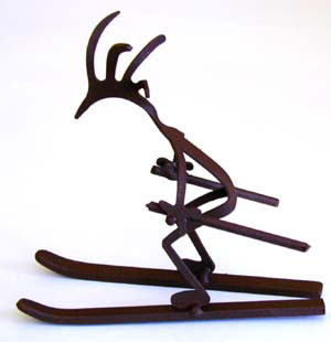 Skiing Kokopelli Figure